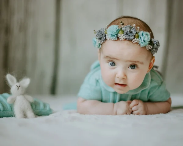 close-up-view-little-female-girl-lying-bed-looking-camera